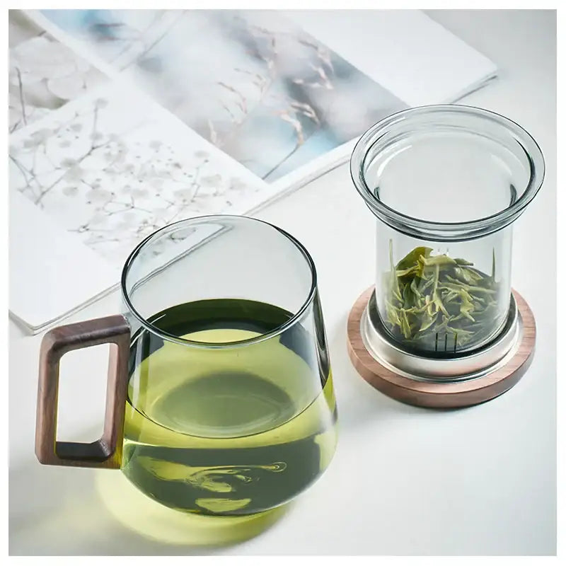 Modern glass tea cup with wood handle for kitchen drinking