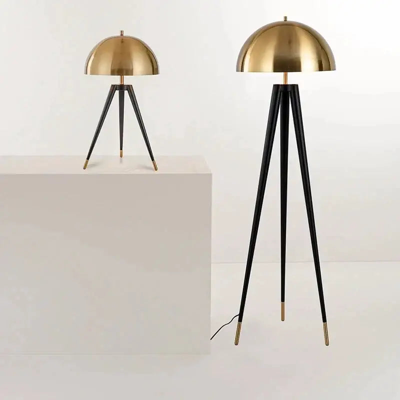 Modern gold and black tripod floor lamp living room decorbites coyote
