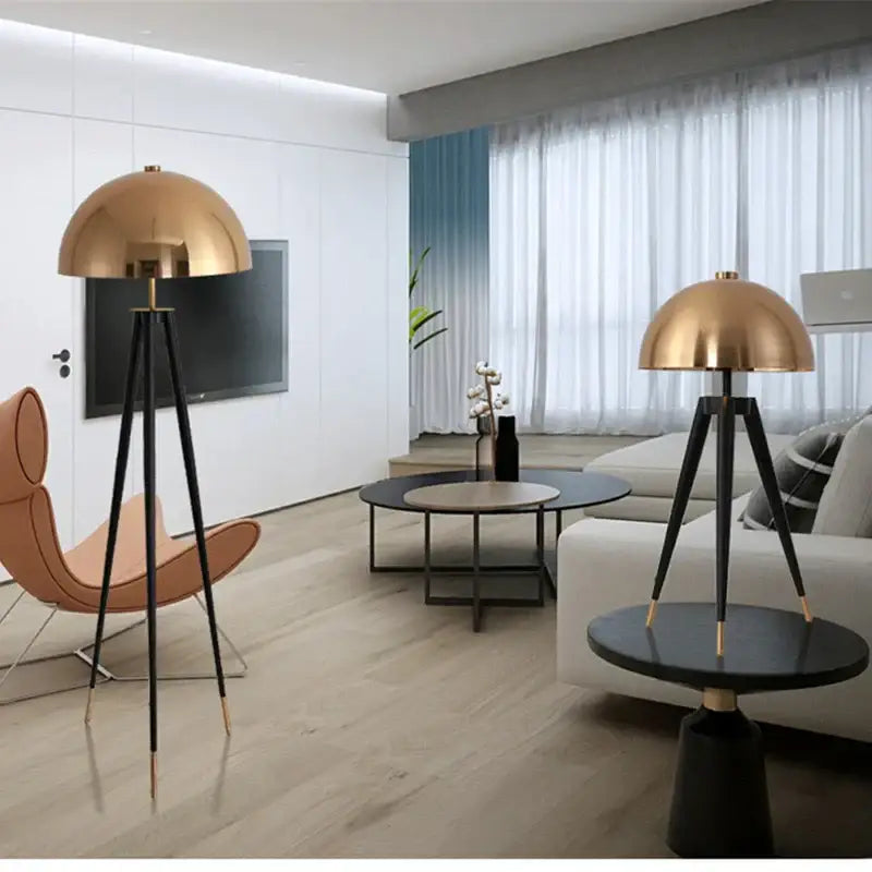 Modern gold and black tripod floor lamp living room decorbites coyote