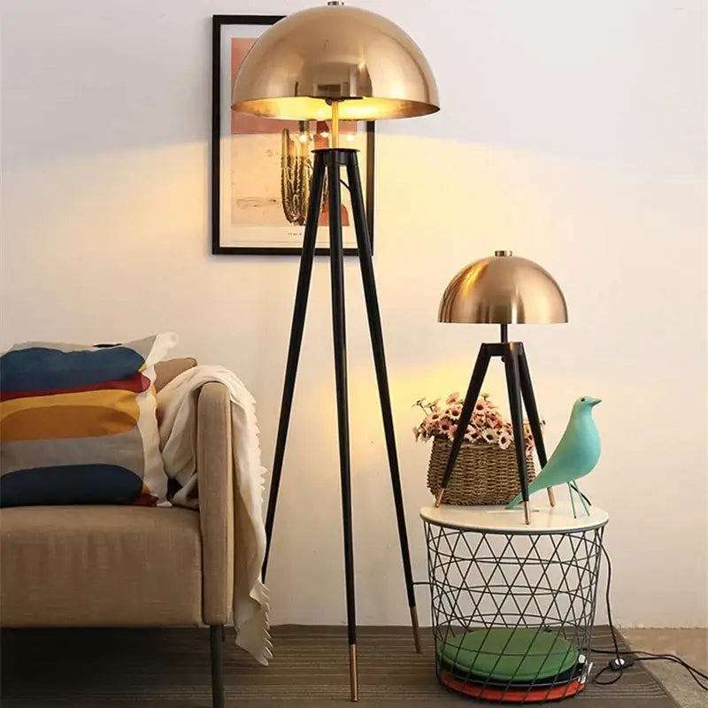 Modern gold and black tripod floor lamp living room decorbites coyote