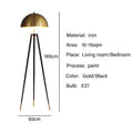 Modern gold and black tripod floor lamp living room decorbites coyote
