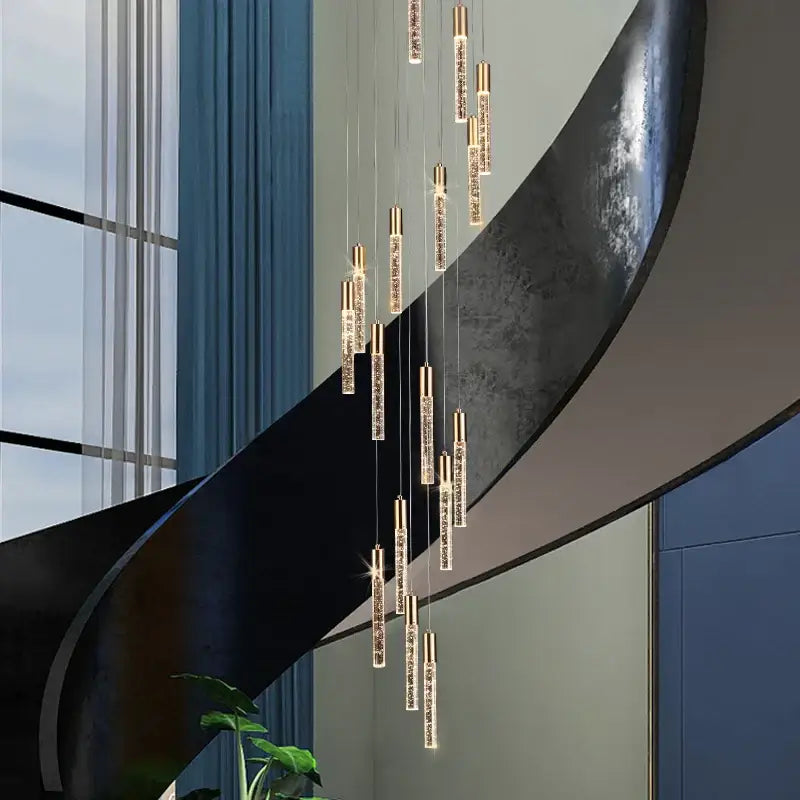 Modern gold and crystal cylindrical stair chandelier living room