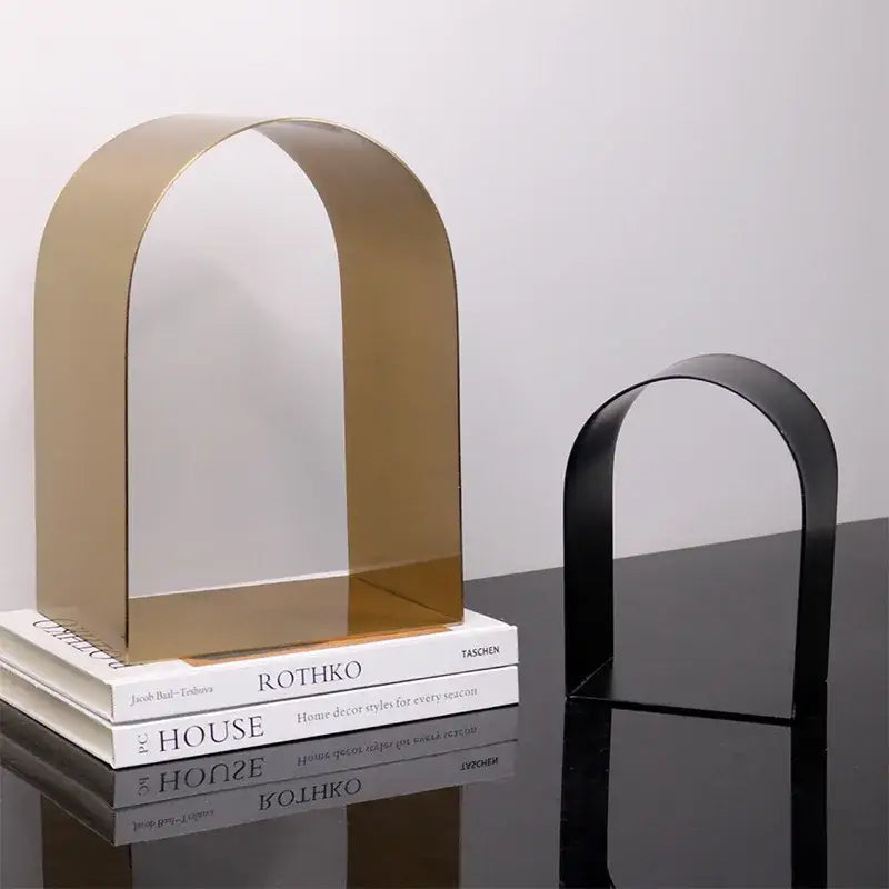 Modern gold & black golden arches metal sculpture living room bookend