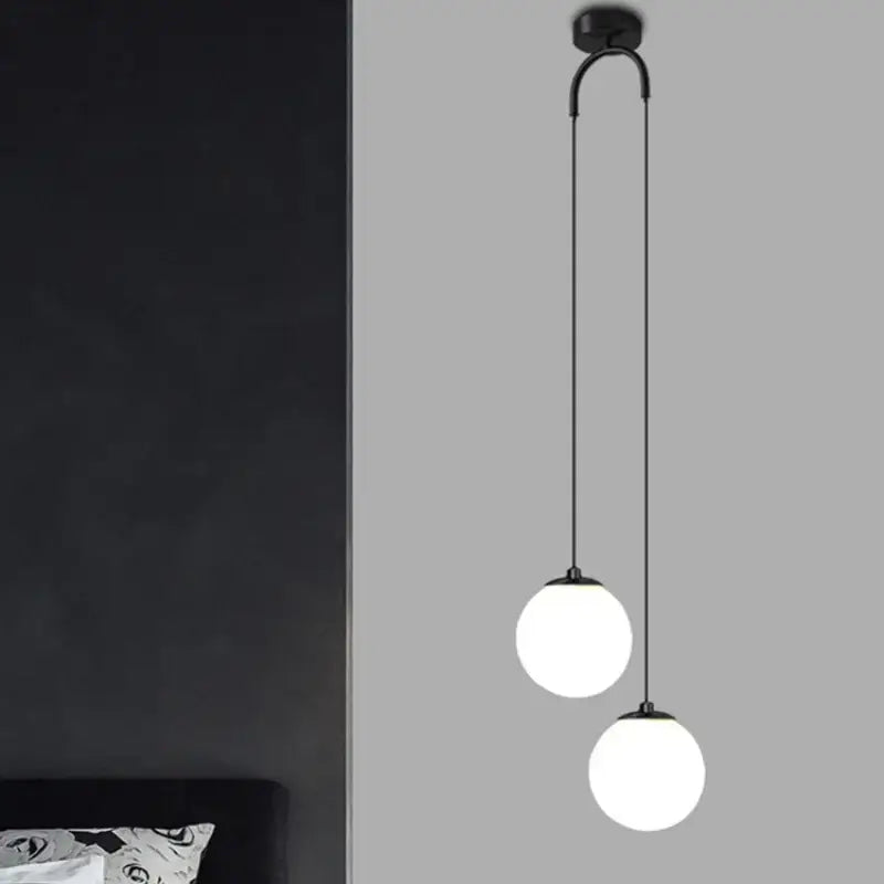 Modern gold glass ball dual head pendant light bedroom