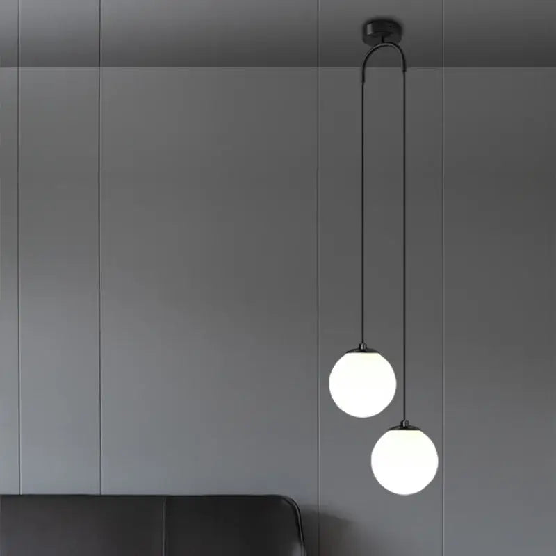 Modern gold glass ball dual head pendant light bedroom