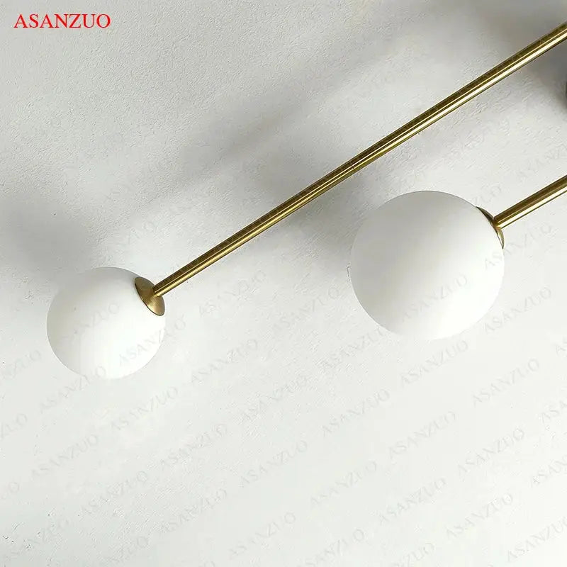 Modern gold glass ball wall lamp bedroom dual frosted sconce