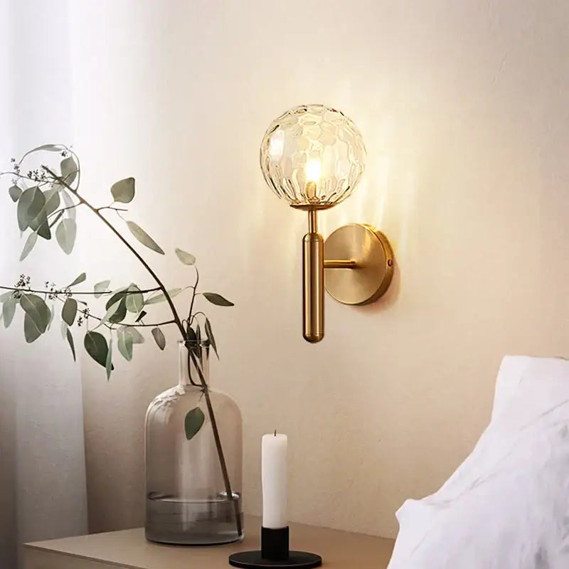 Modern gold iron led sconce lamp with textured glass for bedroom