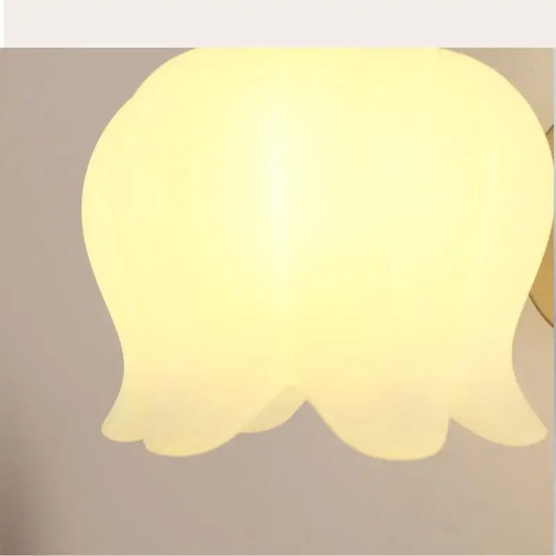 Modern gold led wall sconce with frosted glass for stairway lighting