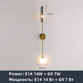 Modern gold metal wall light bedroom sconce with frosted globe