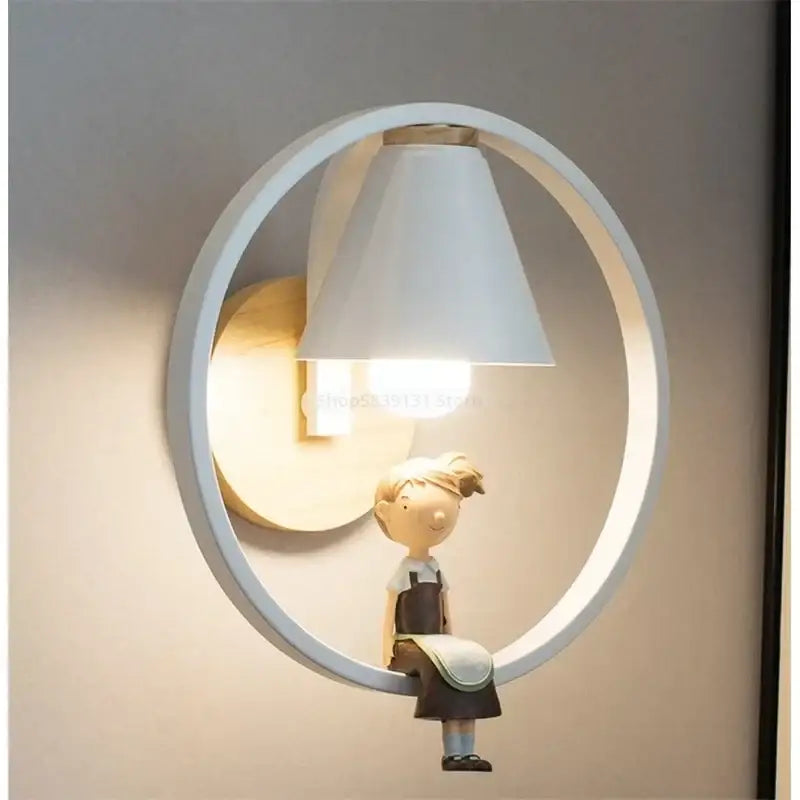 Modern iron led wall lamps with child figurine for bedroom