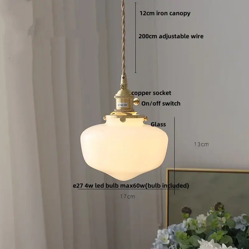 Modern yellow conical pendant light with copper knob for kitchens