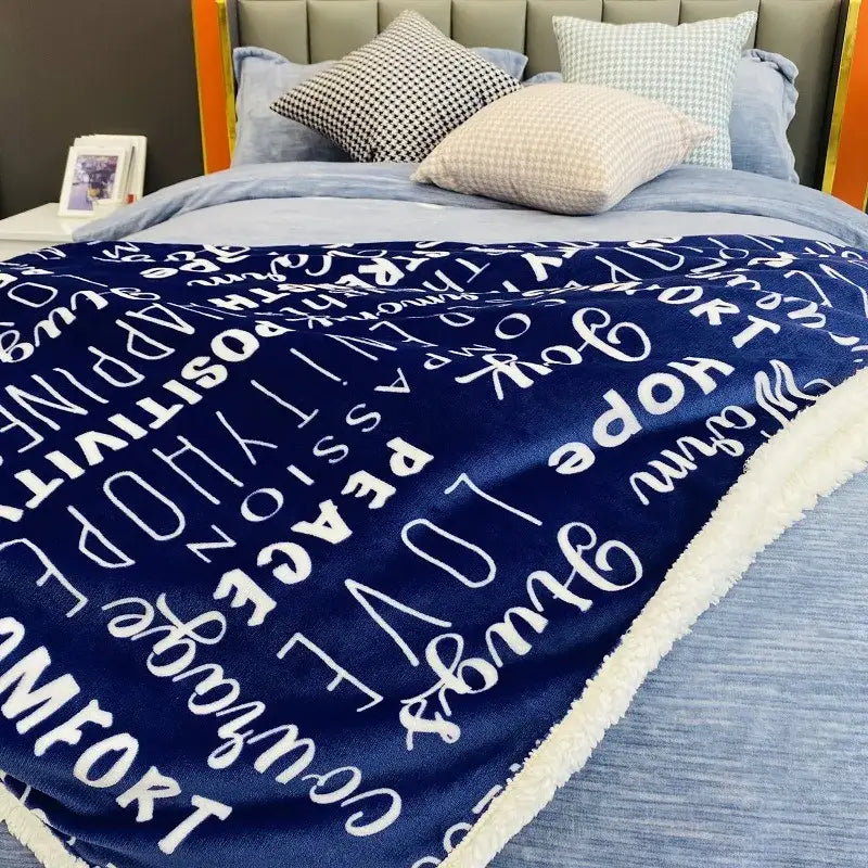 Navy and cream decorbites cozy printed flannel blanket living room