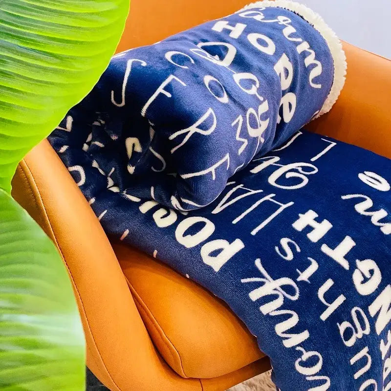 Navy and cream decorbites cozy printed flannel blanket living room