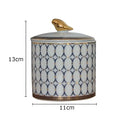 Navy and white geometric storage jar with gold plated bird bedroom decor
