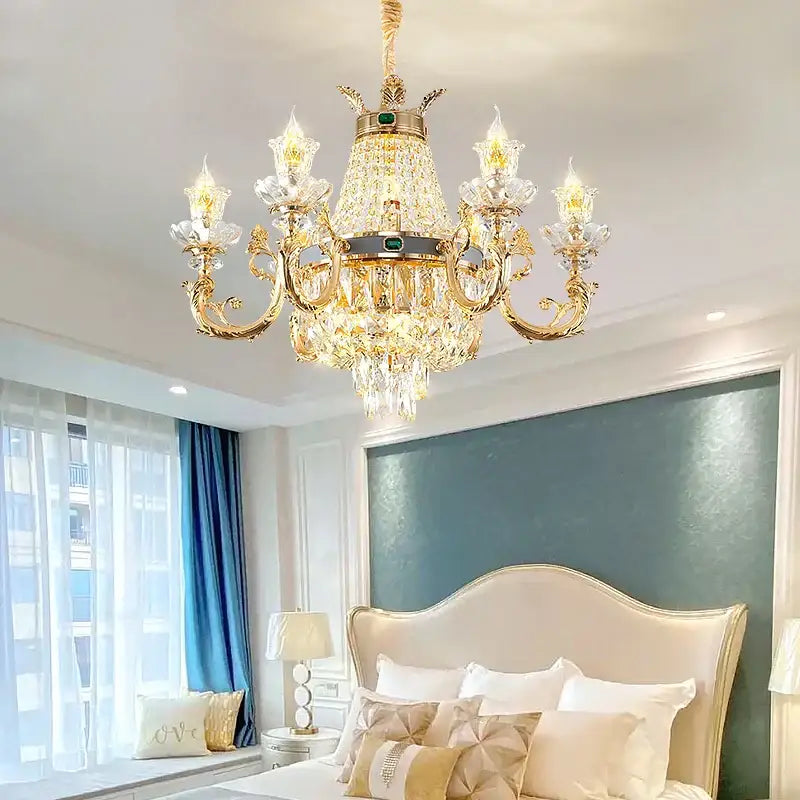 Ornate gold crystal dining room chandelier with green accent stone