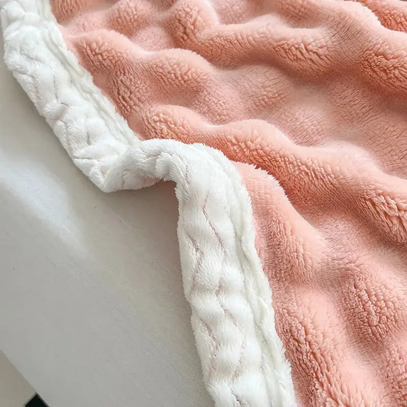 Pink and white textured cozy faux rabbit fur throw blanket bedroom