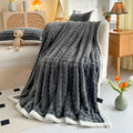 Pink and white textured cozy faux rabbit fur throw blanket bedroom