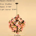 Pink cherry blossoms green plants pendant light dining room