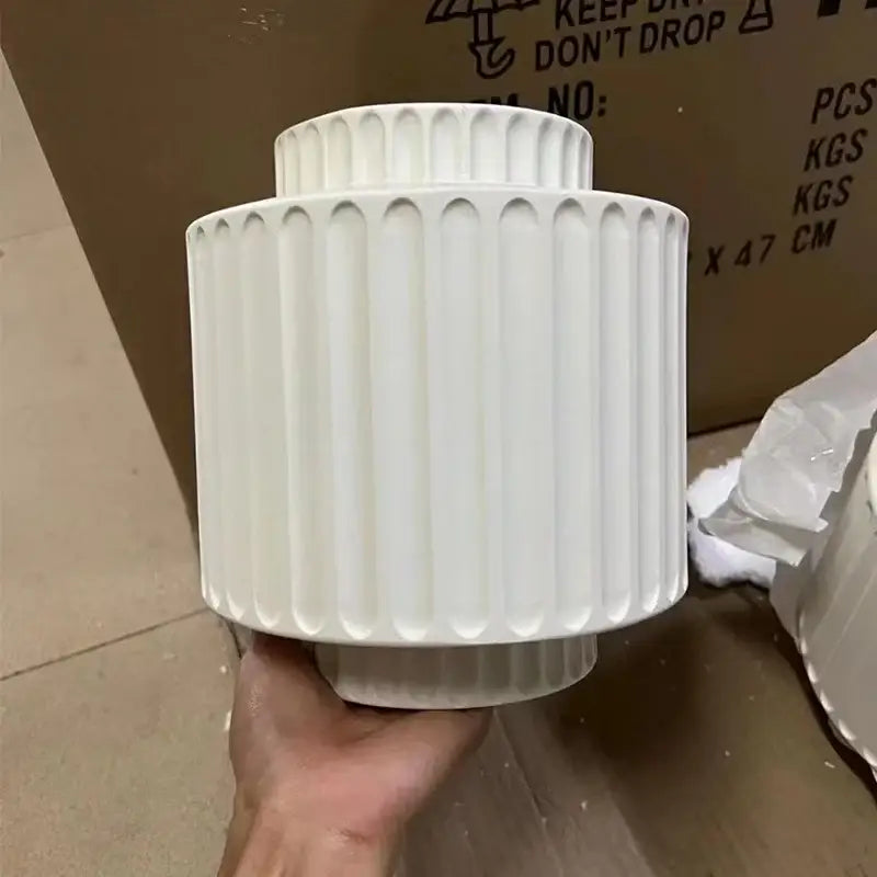 Ridged cream white resin wall sconce bedroom light