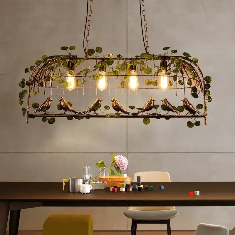 Rustic bronze iron bird cage chandelier dining room greenery light