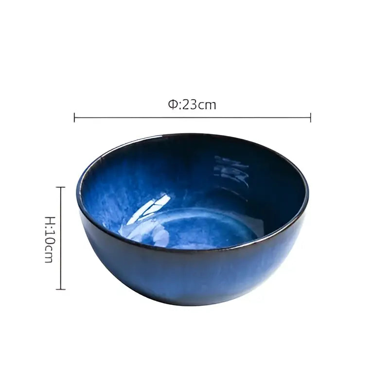 Rustic deep blue ceramic salad bowl with wooden fork dining room