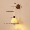 Textured glass and brass wall light fixture for dining room