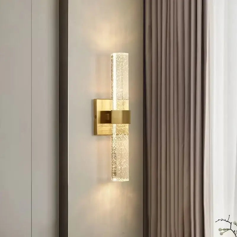 Textured glass gold wall sconce bedroom warm diffusing light