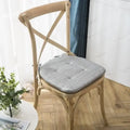 Tufted beige textured dining chair cushions for dining room