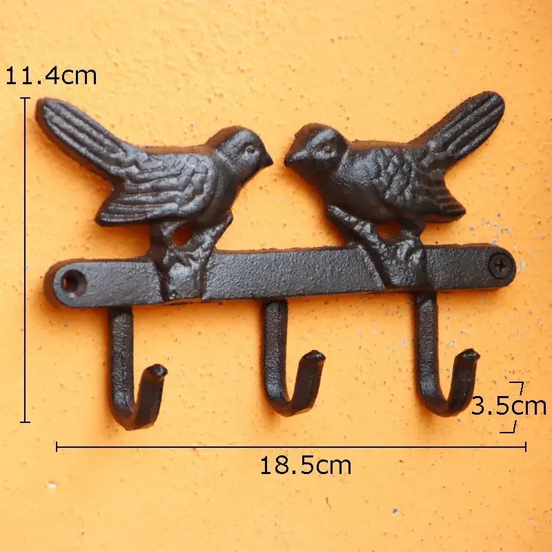 Vintage black iron bird hook wall shelf for entryway storage