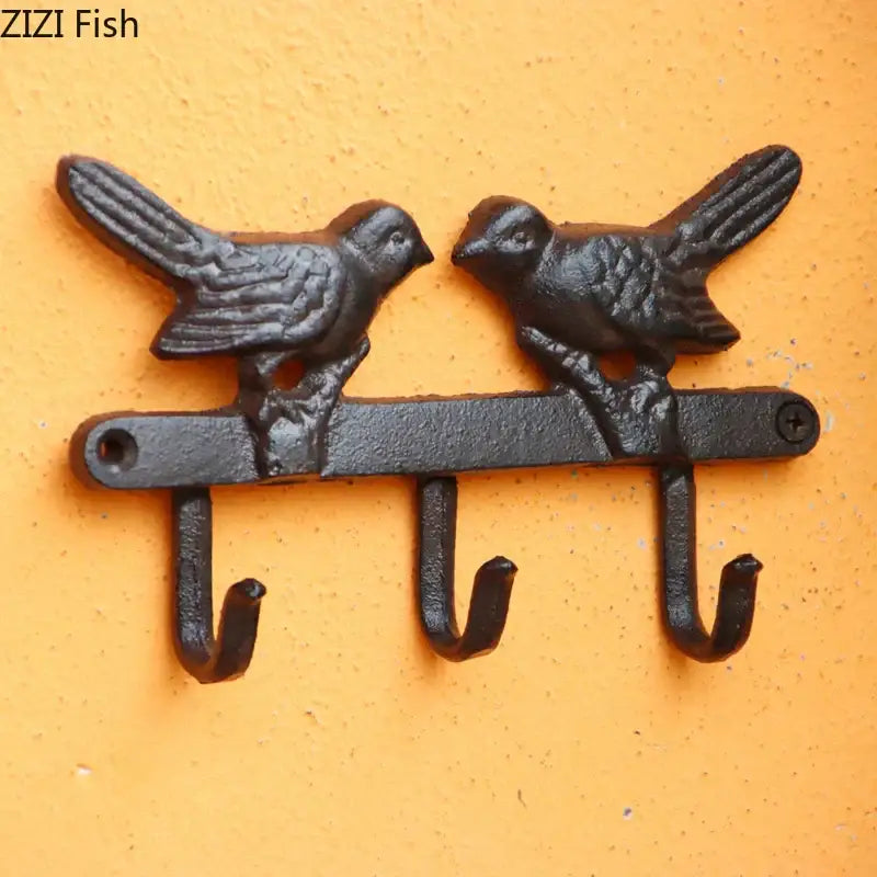 Vintage black iron bird hook wall shelf for entryway storage