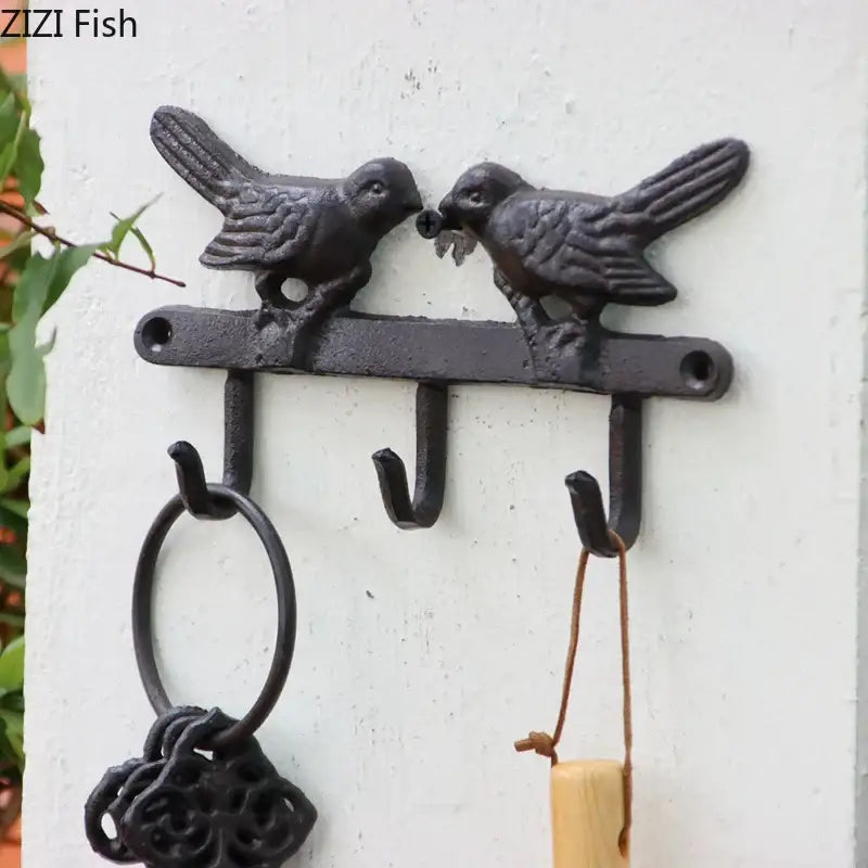 Vintage black iron bird hook wall shelf for entryway storage