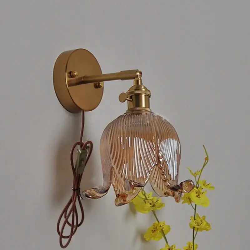 Vintage brass and amber glass wall light bedroom flower sconce
