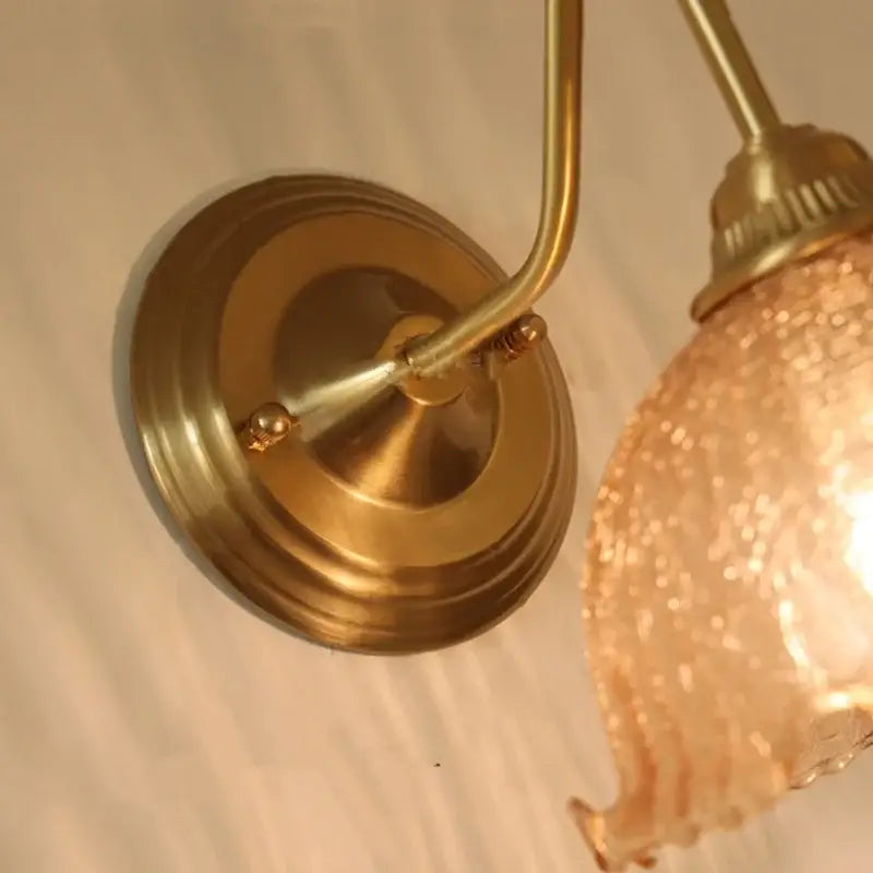 Vintage brass and amber glass wall sconce bedroom vanity light