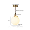 Vintage brass and cream glass ball pendant light for kitchen