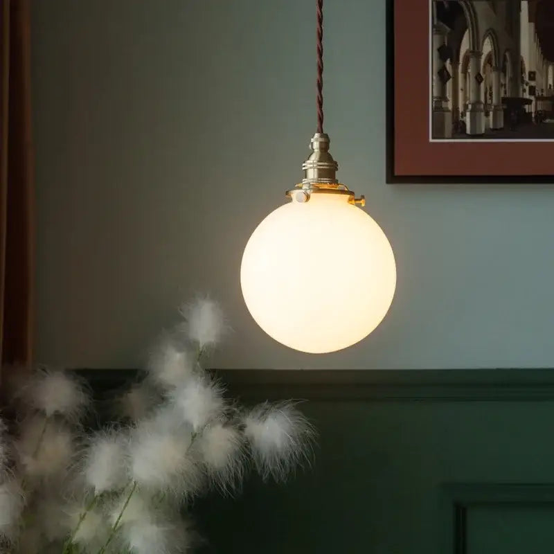 Vintage brass and cream glass ball pendant light for kitchen