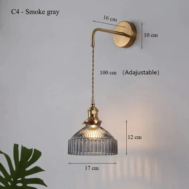 Vintage brass wall lamp with ribbed glass shade for living room
