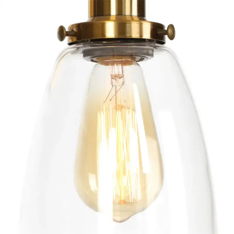 Vintage brass wall light fixture with glass dome for bedroom