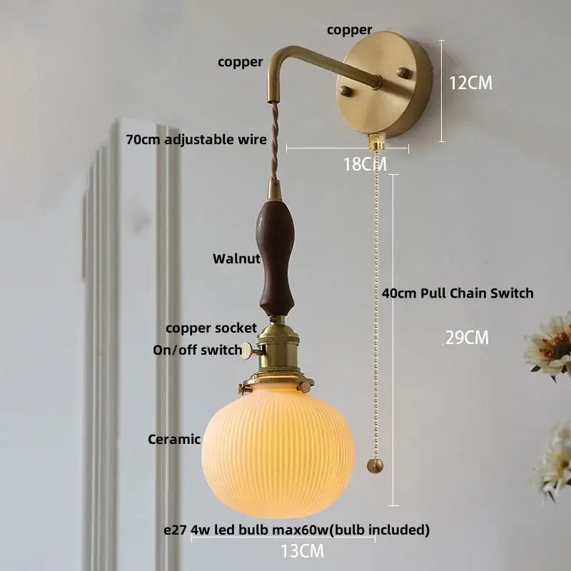 Vintage brass wall light with ribbed glass and knob switch bedroom