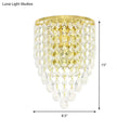 Vintage gold tapered wall mount with clear crystal draping bedroom light