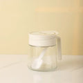 Yellow flip top glass seasoning jar with spoon kitchen spice shaker