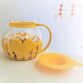 Yellow silicone and clear glass popcorn maker kitchen colander lid